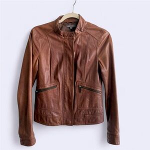 Vince brand
Brown collarless leather jacket with zipper and snaps XS